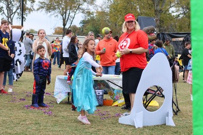 Families enjoying activities at Harvest Weekend