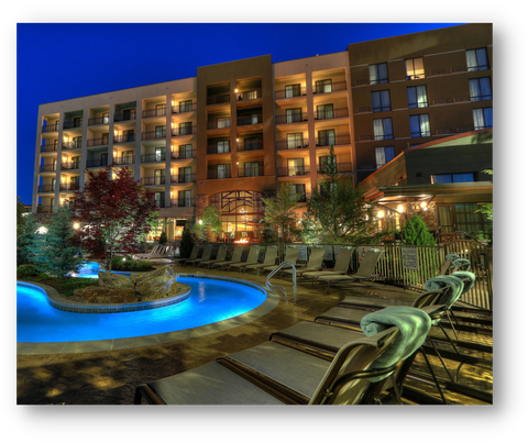 Courtyard Marriott exterior and pool at night